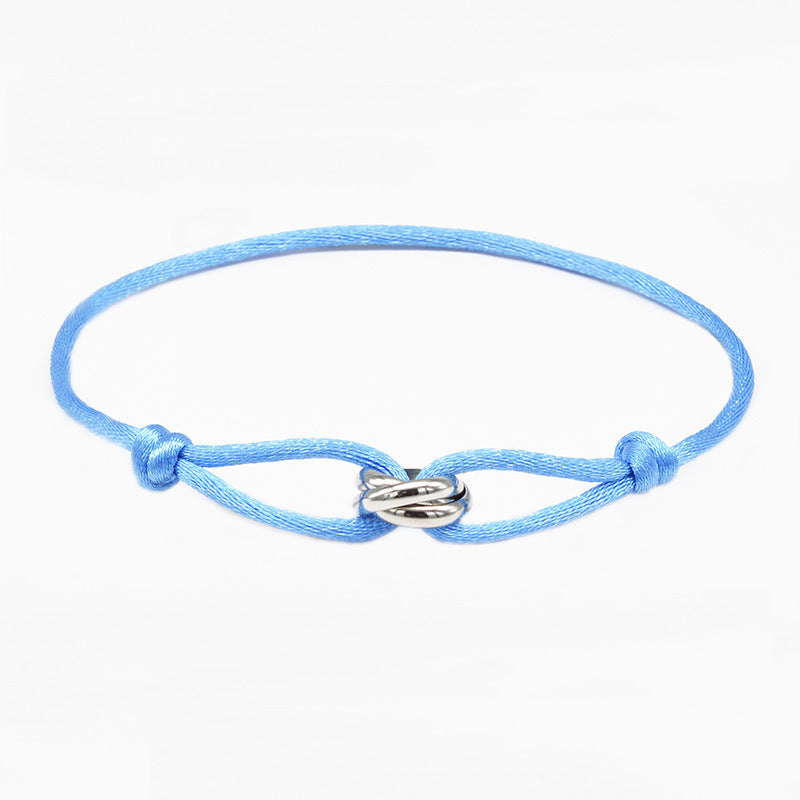 Verstellbares hellblaues Armband mit ineinandergreifenden Edelstahlringen – Unisex & Minimalistisch