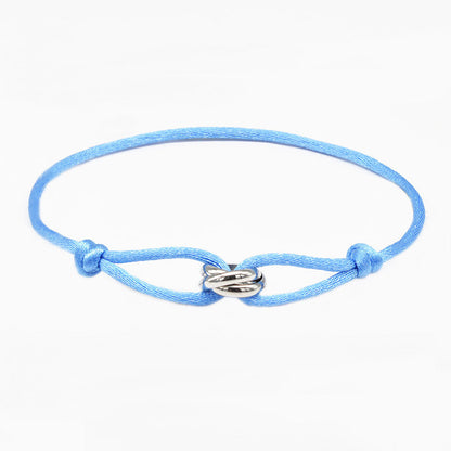 Verstellbares hellblaues Armband mit ineinandergreifenden Edelstahlringen – Unisex & Minimalistisch