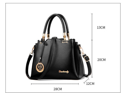 Elegante Damenhandtasche aus Kunstleder – Schwarze Struktur-Tote mit goldenen Details und Schulterriemen