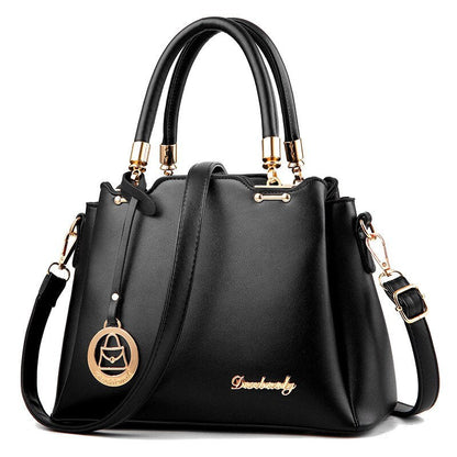Elegante Damenhandtasche aus Kunstleder – Schwarze Struktur-Tote mit goldenen Details und Schulterriemen